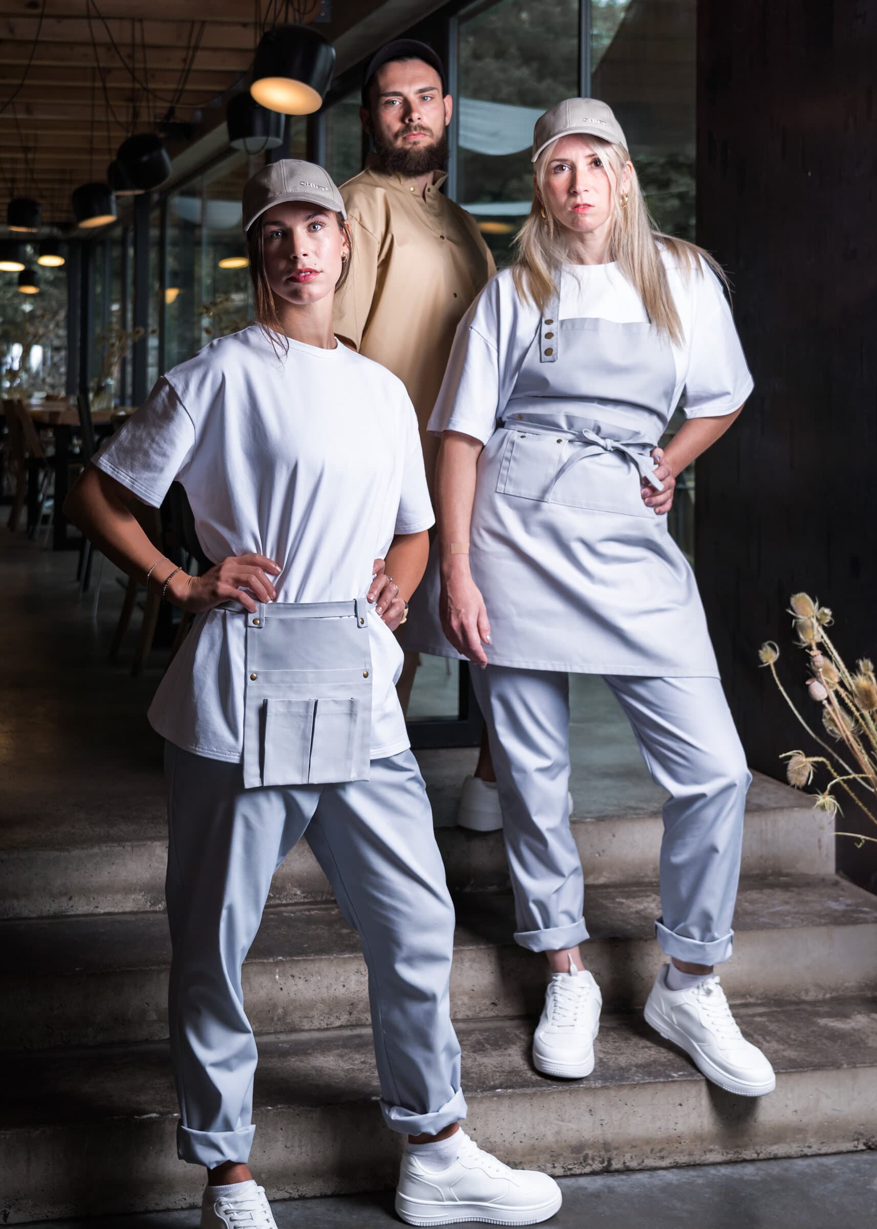 Team in grey and sand Shift Studio uniforms